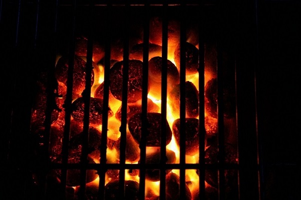 Coals burning in a fire pit